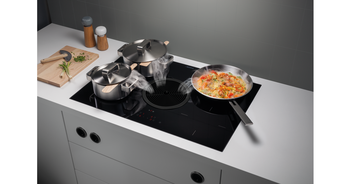 BORA S Pure intégré dans une cuisine ouverte avec aspiration centrale